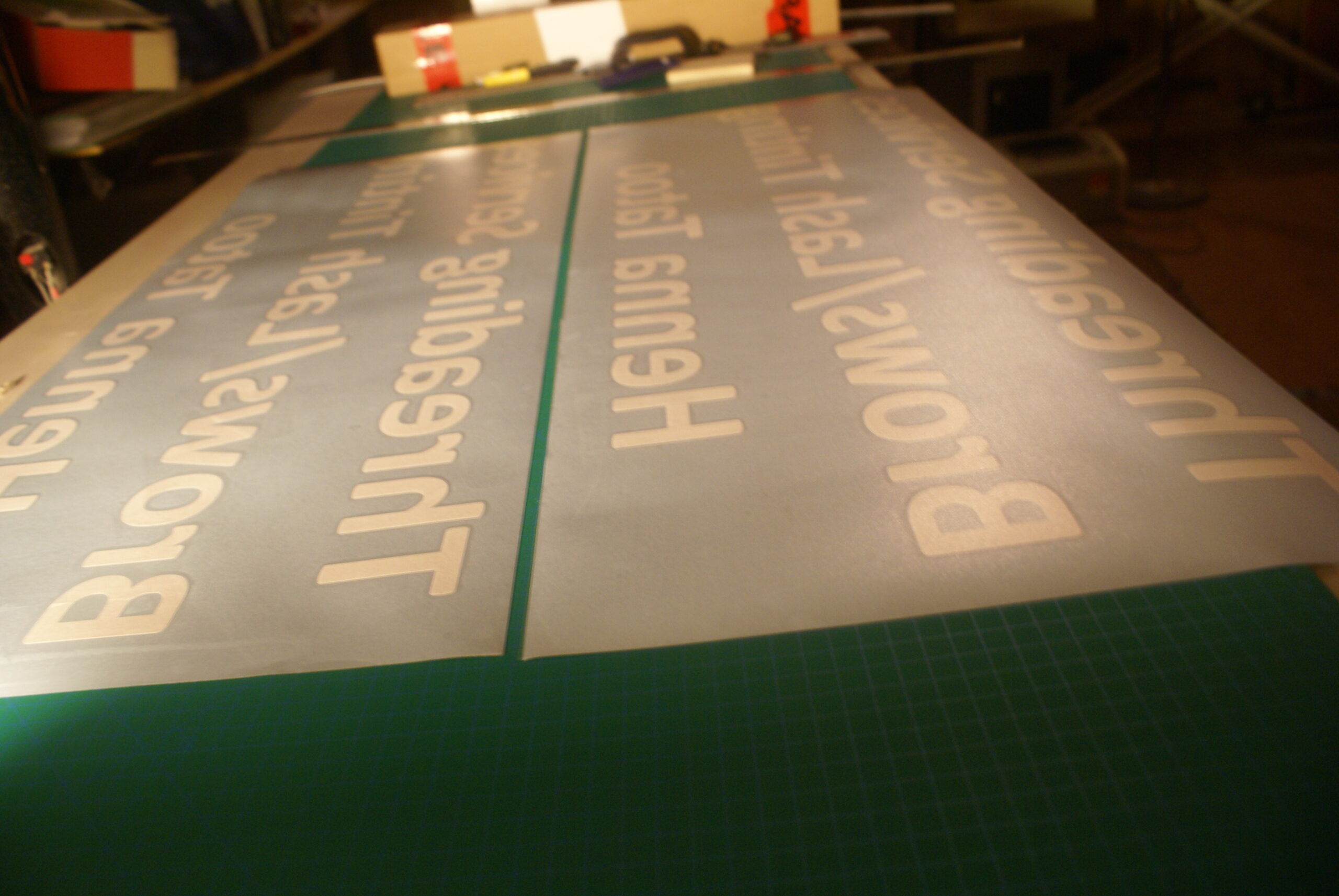 Vinyl text being prepared for cutting