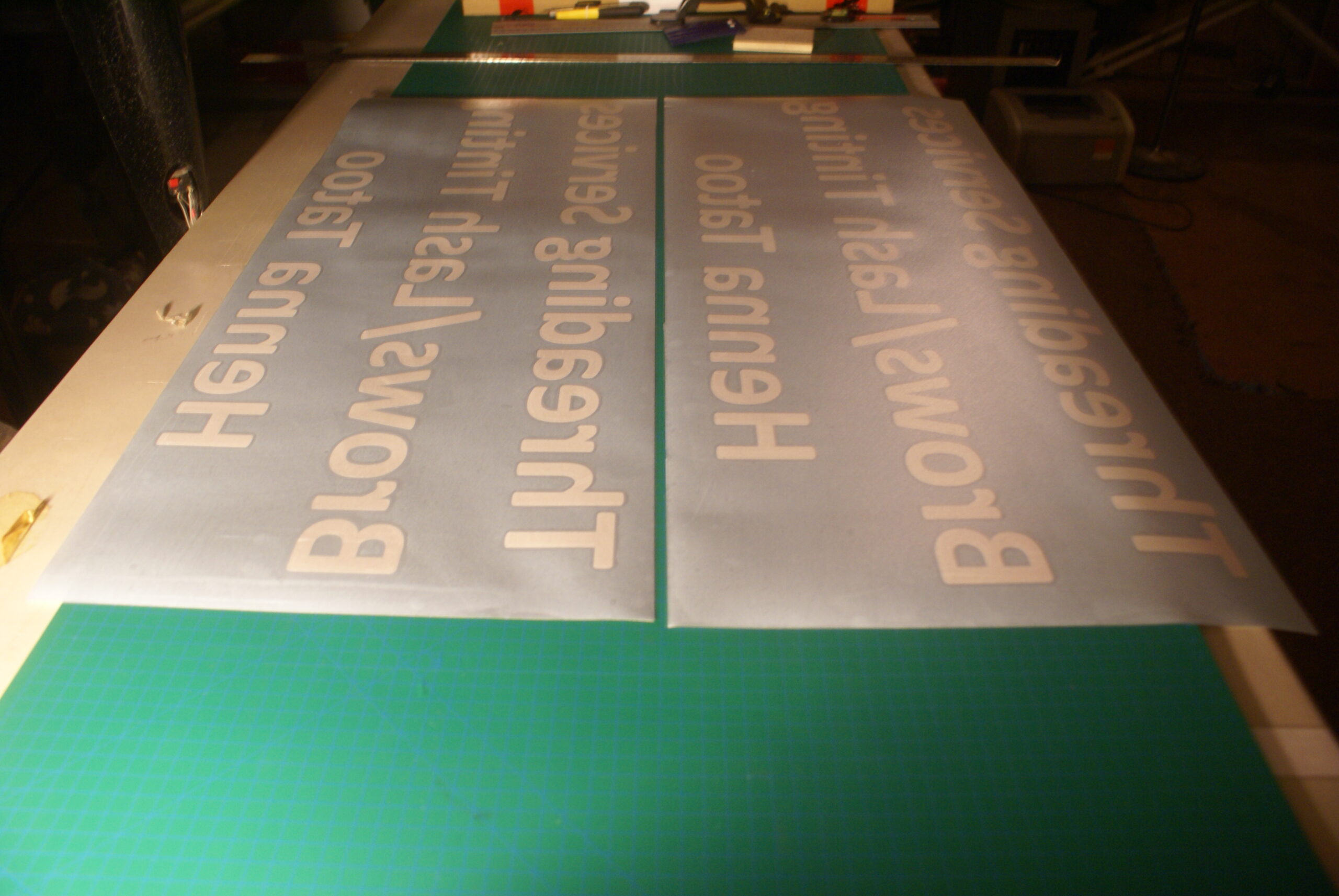 Pre-masked vinyl text job piece